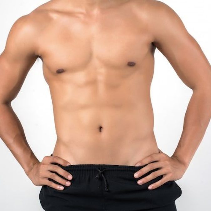 muscular-man-showing-six-pack-ab